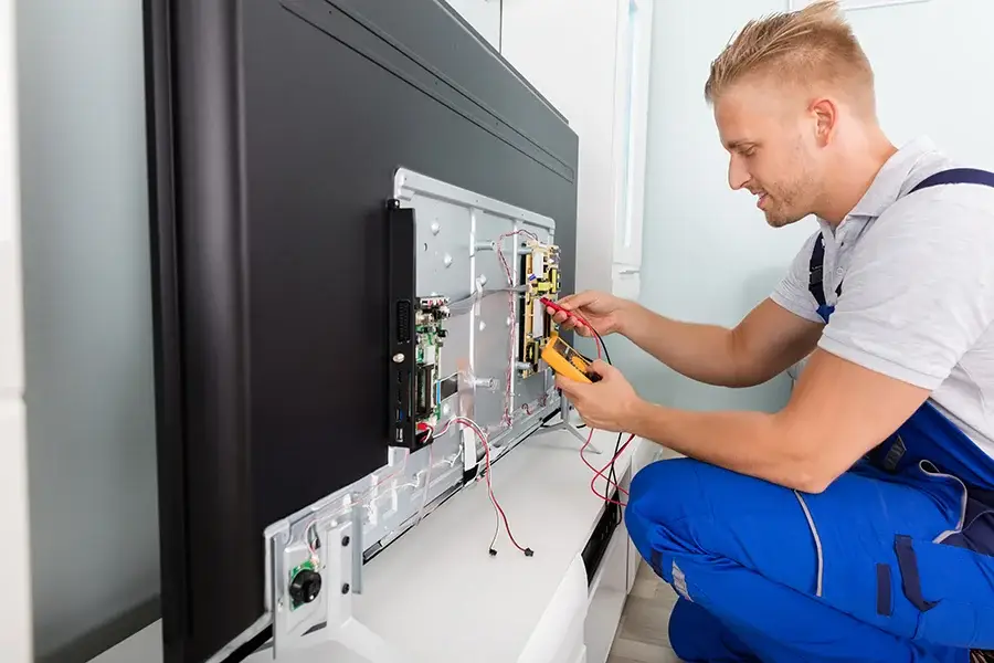 Technician installing a smart home device